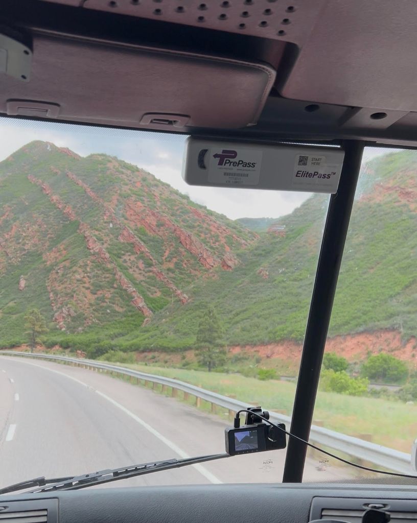 Driving through mountains in a big rig